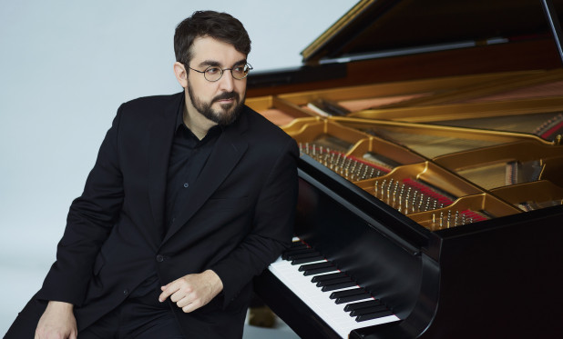 a photo of Charles Richard-Hamelin with a piano